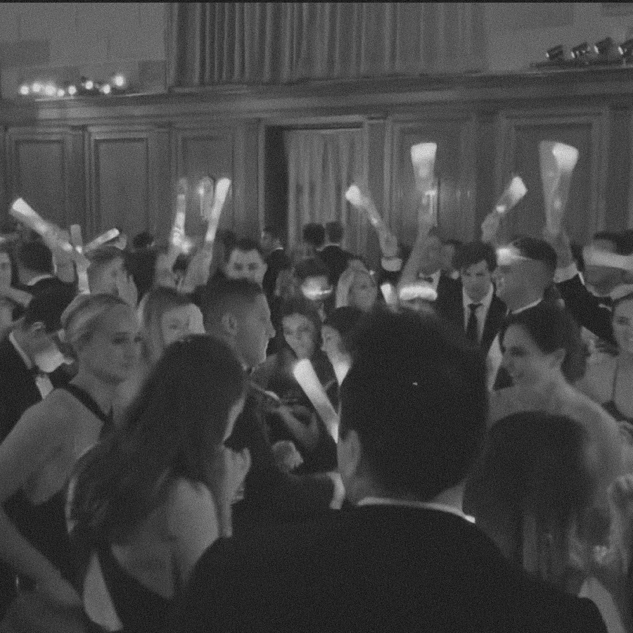 Vibrant after party with dancing guests.