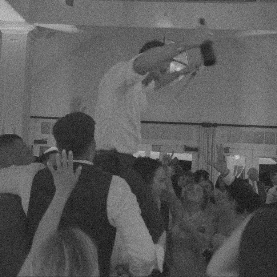 Lively wedding reception dance floor.