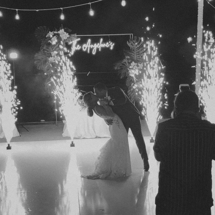 Cold spark fountains creating a dramatic effect at a wedding.